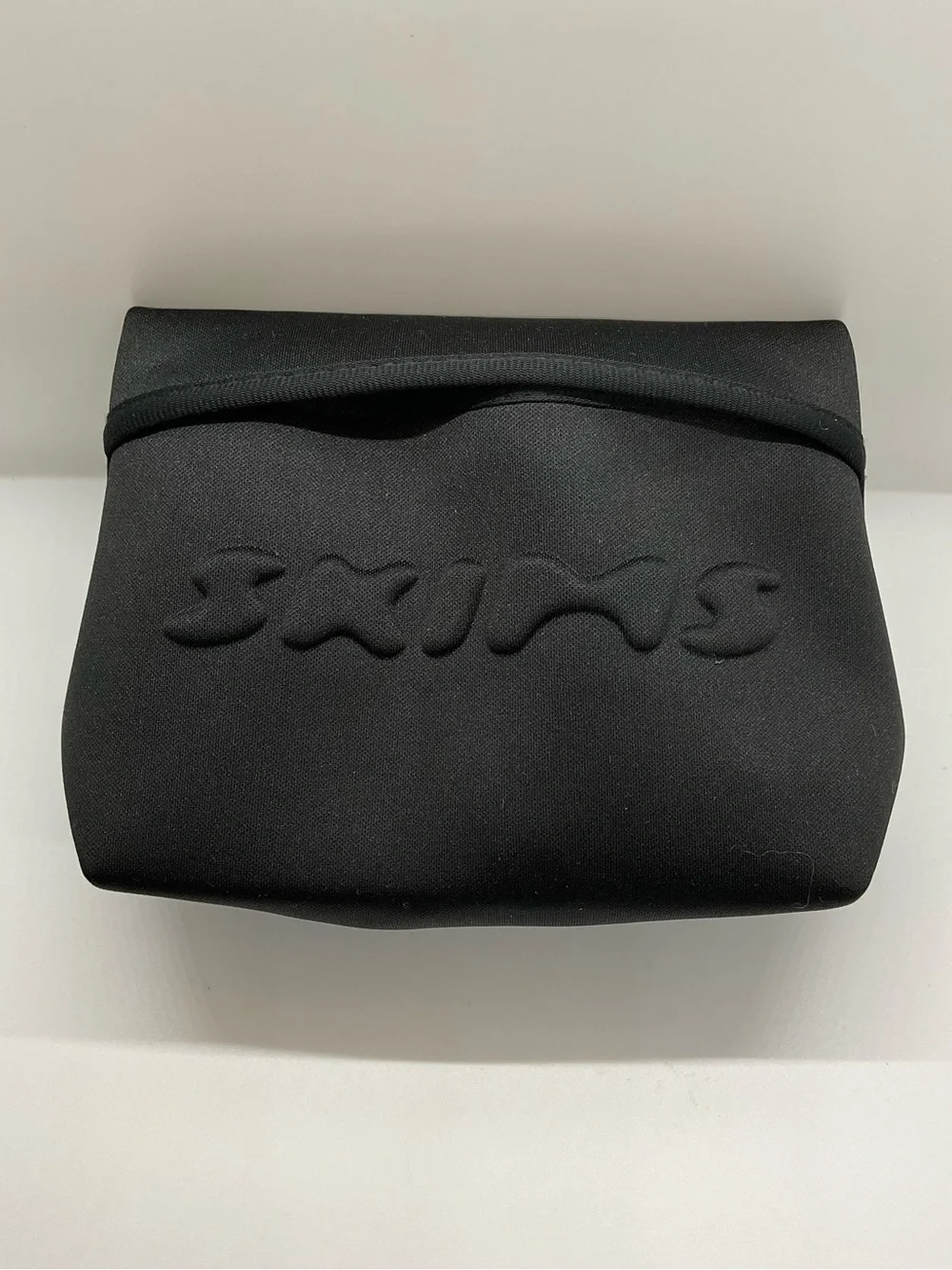 New SKIMS Black Neoprene Cosmetic Makeup Toiletry Pouch Bag